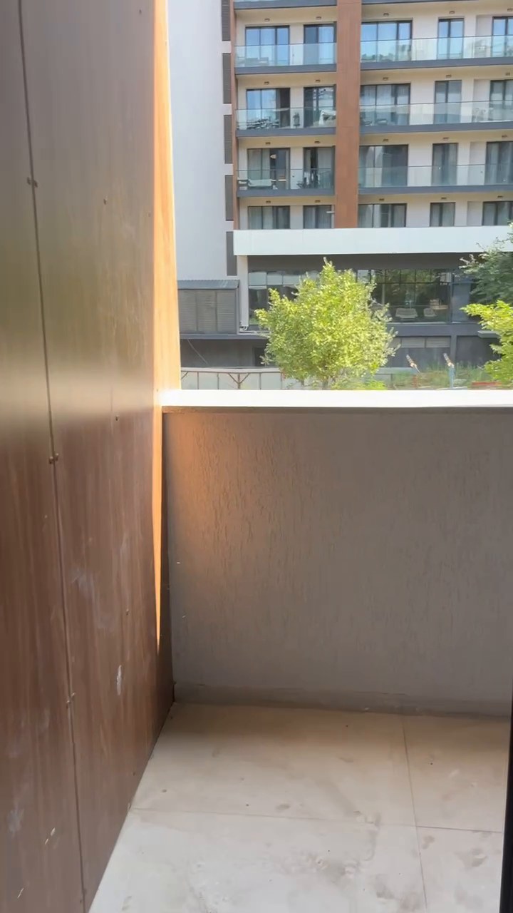 Balcony with timber-look clad reveals and a finished floor
